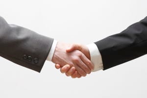 business partners shaking hands