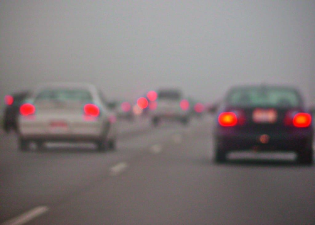 traffic on busy road, foggy road